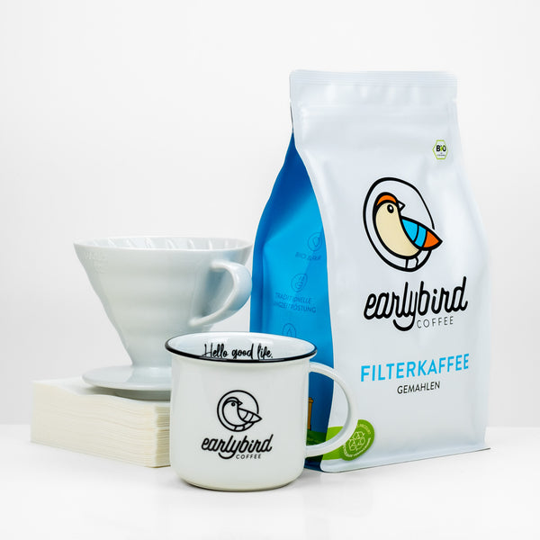 earlybird Filterkaffee Starter Kit mit Bio Filterkaffee gemahlen oder als ganze Bohne, einer earlybird Tasse, einem Keramikfilter von Hario und Hario Papierfiltern