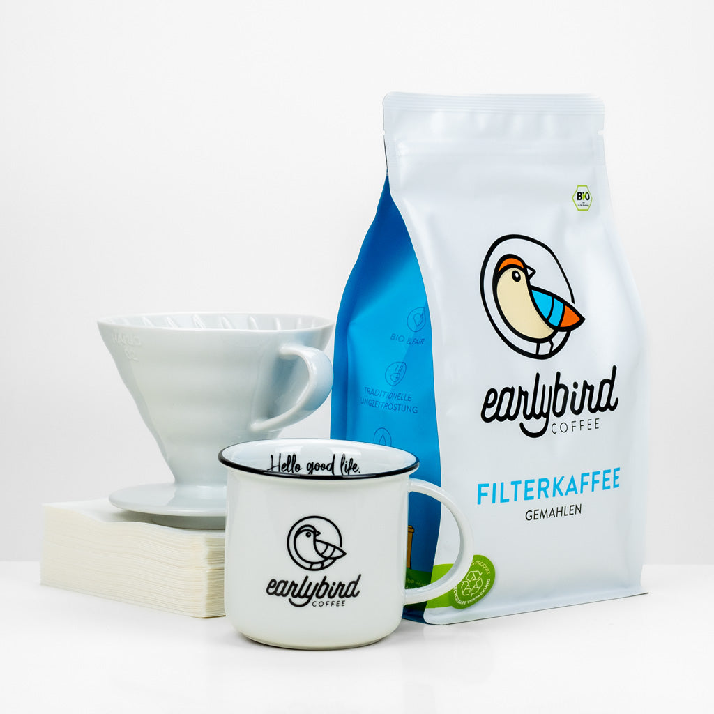 earlybird Filterkaffee Starter Kit mit Bio Filterkaffee gemahlen oder als ganze Bohne, einer earlybird Tasse, einem Keramikfilter von Hario und Hario Papierfiltern